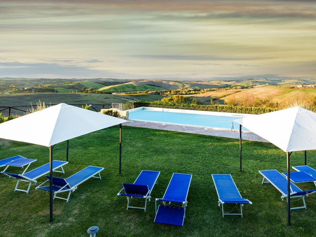 Swimming Pool with sun beds.