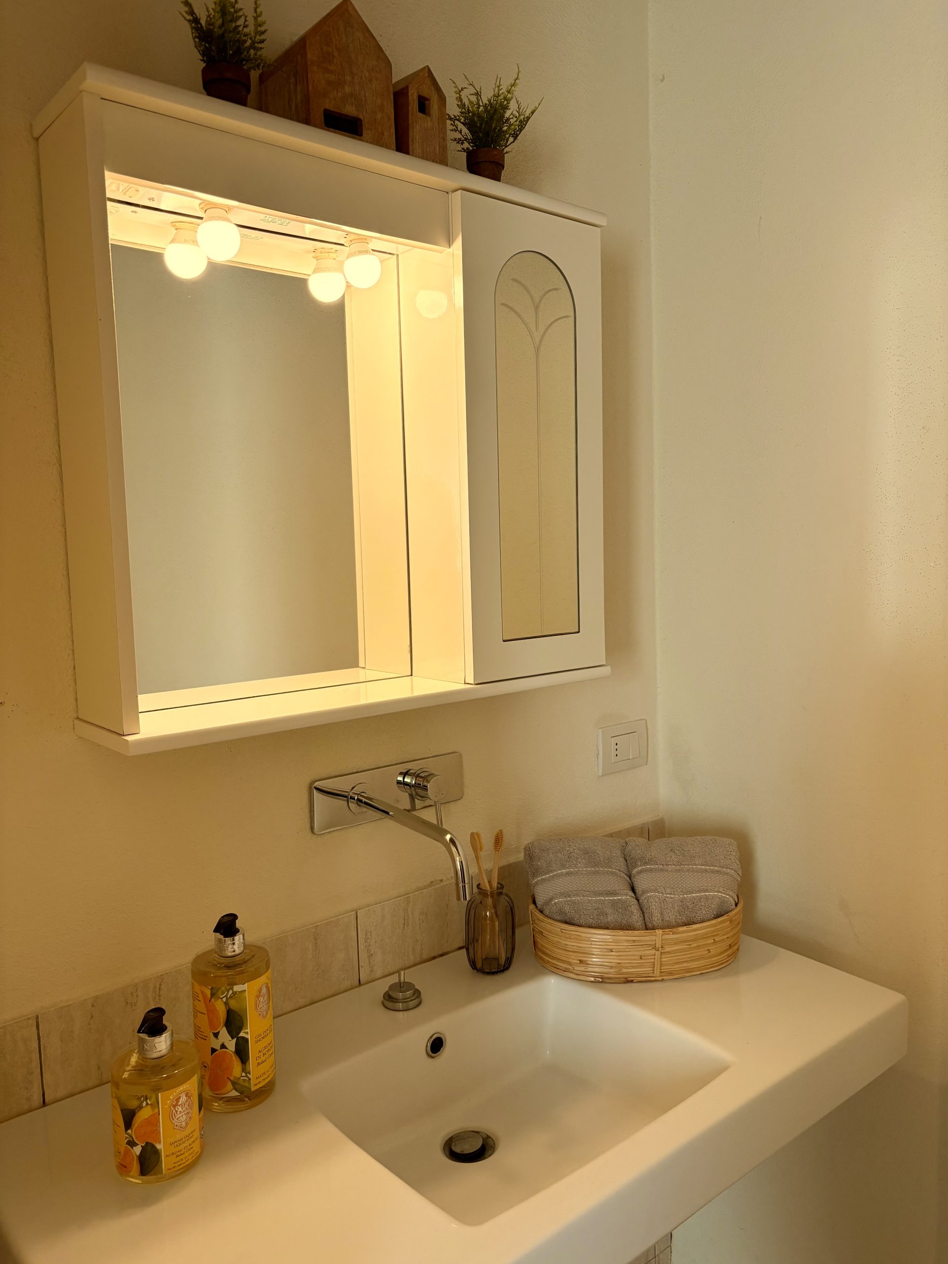 Master bathroom sink and vanity with Italian soaps